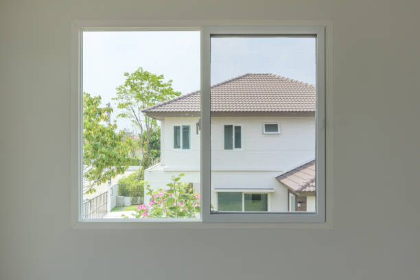 Slider windows frame house interior on white wall