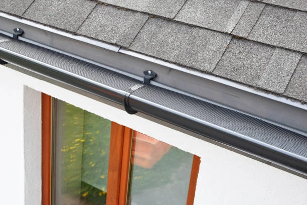 Gutter guard installation is to prevent debris buildup and reduce maintenance.