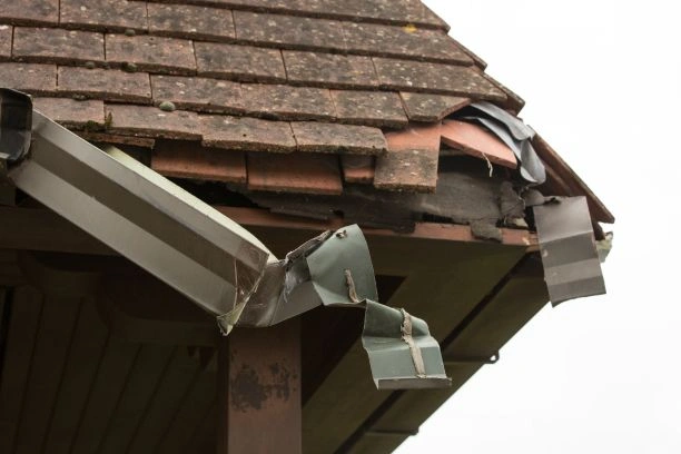 Severe hail impact on roof shingles requiring immediate repair - Hail damage roof repair
