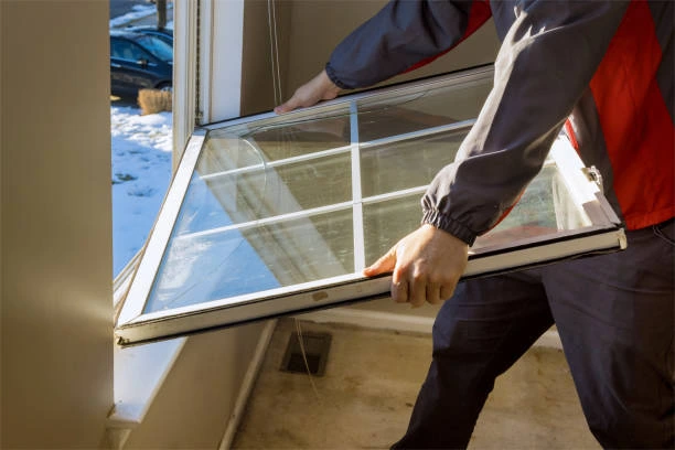 Energy-efficient replacement windows installed in a modern home exterior