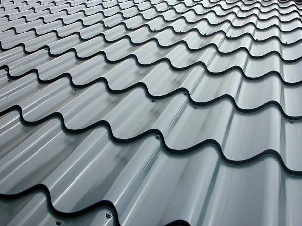 Close-up of textured metal panels installed through professional metal roofing services
