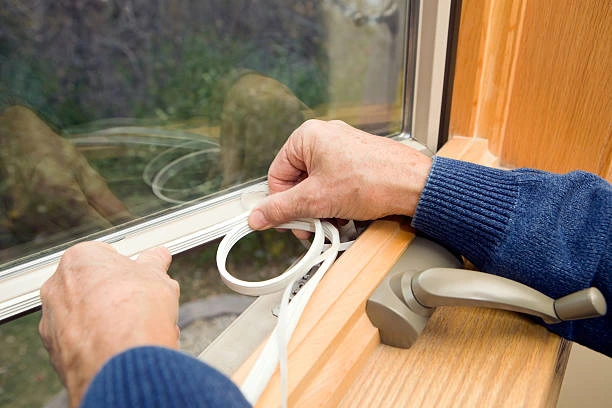 Modern home exterior featuring newly installed energy-efficient replacement windows
