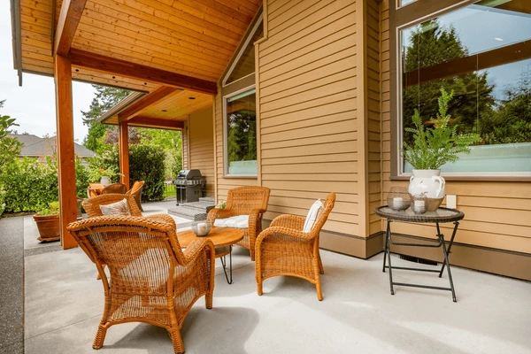 Home exterior with newly installed natural wood siding in a rich cedar finish