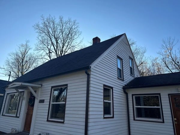 Comparison of vinyl, wood, and fiber cement siding panels showing durability and style differences.