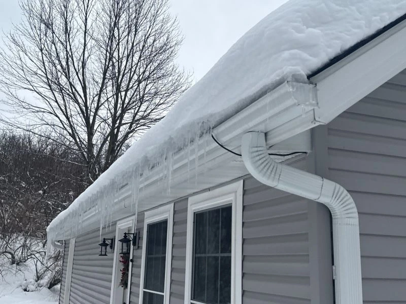 Attic insulation and ventilation diagram showing airflow that supports ice dam prevention and reduces roof heat loss