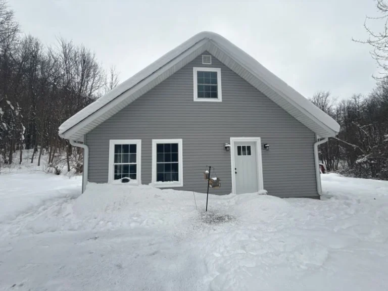 Ice and water shield placement on roof eaves and valleys by Worthy Construction LLC to prevent leaks and ice dams.