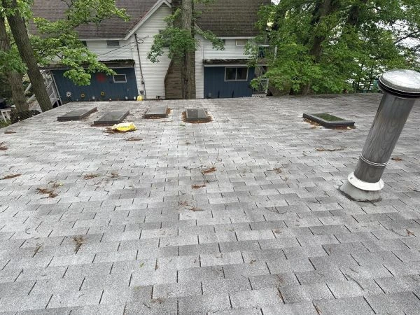 Visible soft spots on roof being inspected safely from ground level