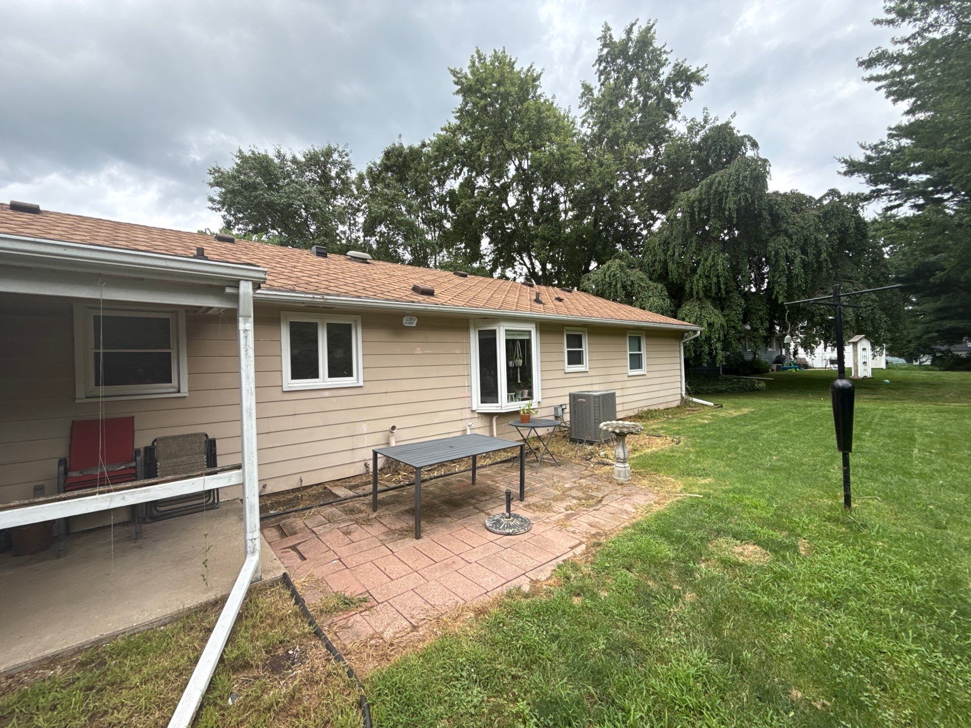 Siding panels rattling in the wind due to loose fasteners, gaps, or improper installation on a home exterior.