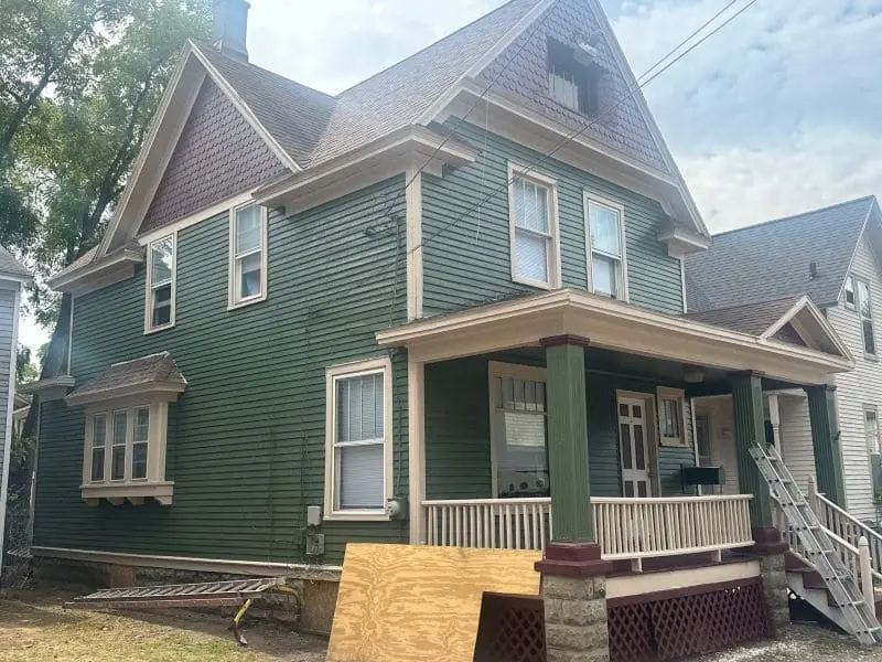 Visible siding seams on home exterior panels showing gaps, joint problems, and weather-related siding wear.